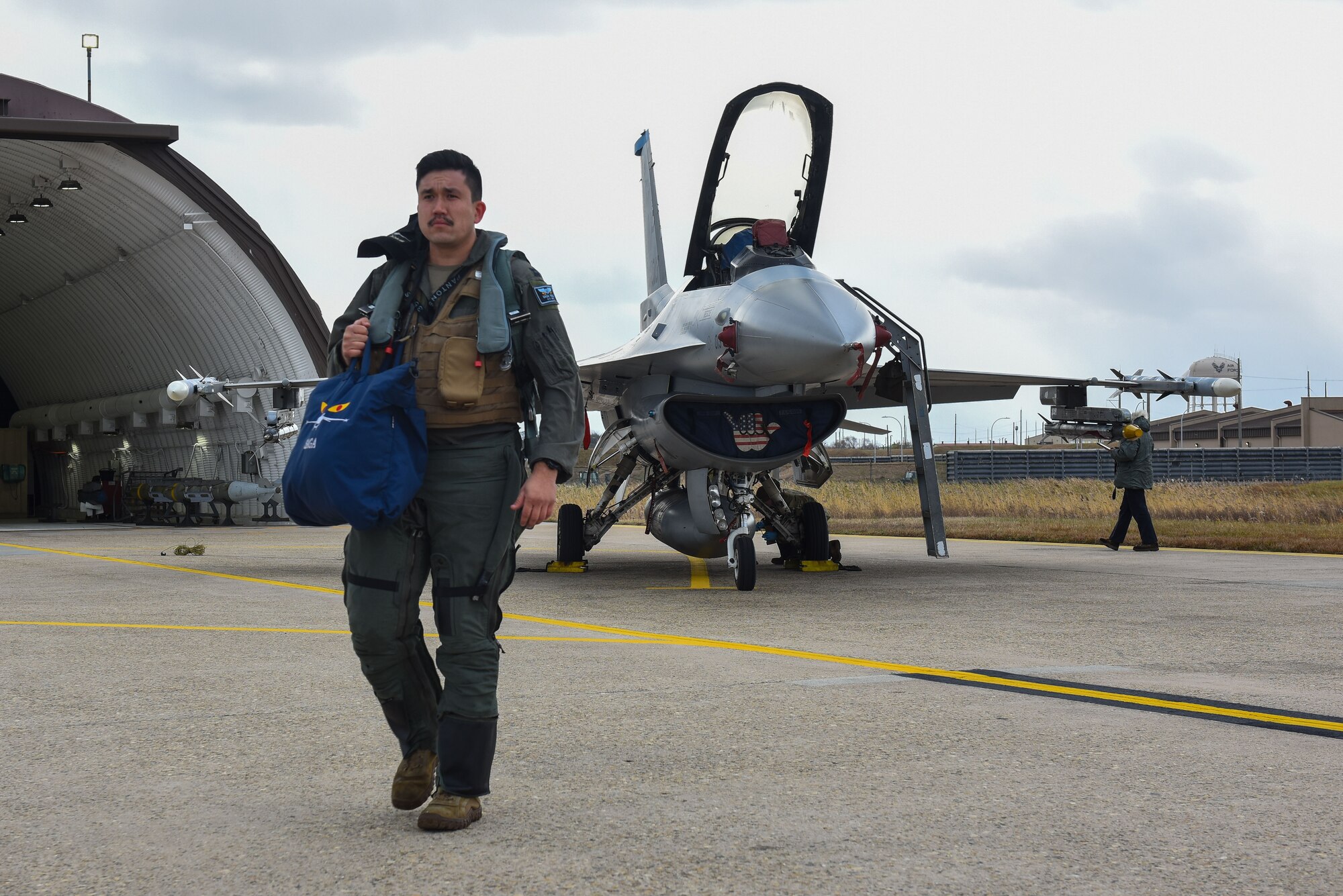 U.S. Air Force Capt. Matthew Hale, 35th Fighter Squadron pilot, departs from an F-16 Fighting 
Falcon after a post-flight check at Kunsan Air Base, Republic of Korea, Nov. 30, 2022. Hale 
embraces his Native American heritage and enjoys sharing his background and culture with 
those around him. (U.S. Air Force photo by Tech Sgt. Timothy Dischinat)