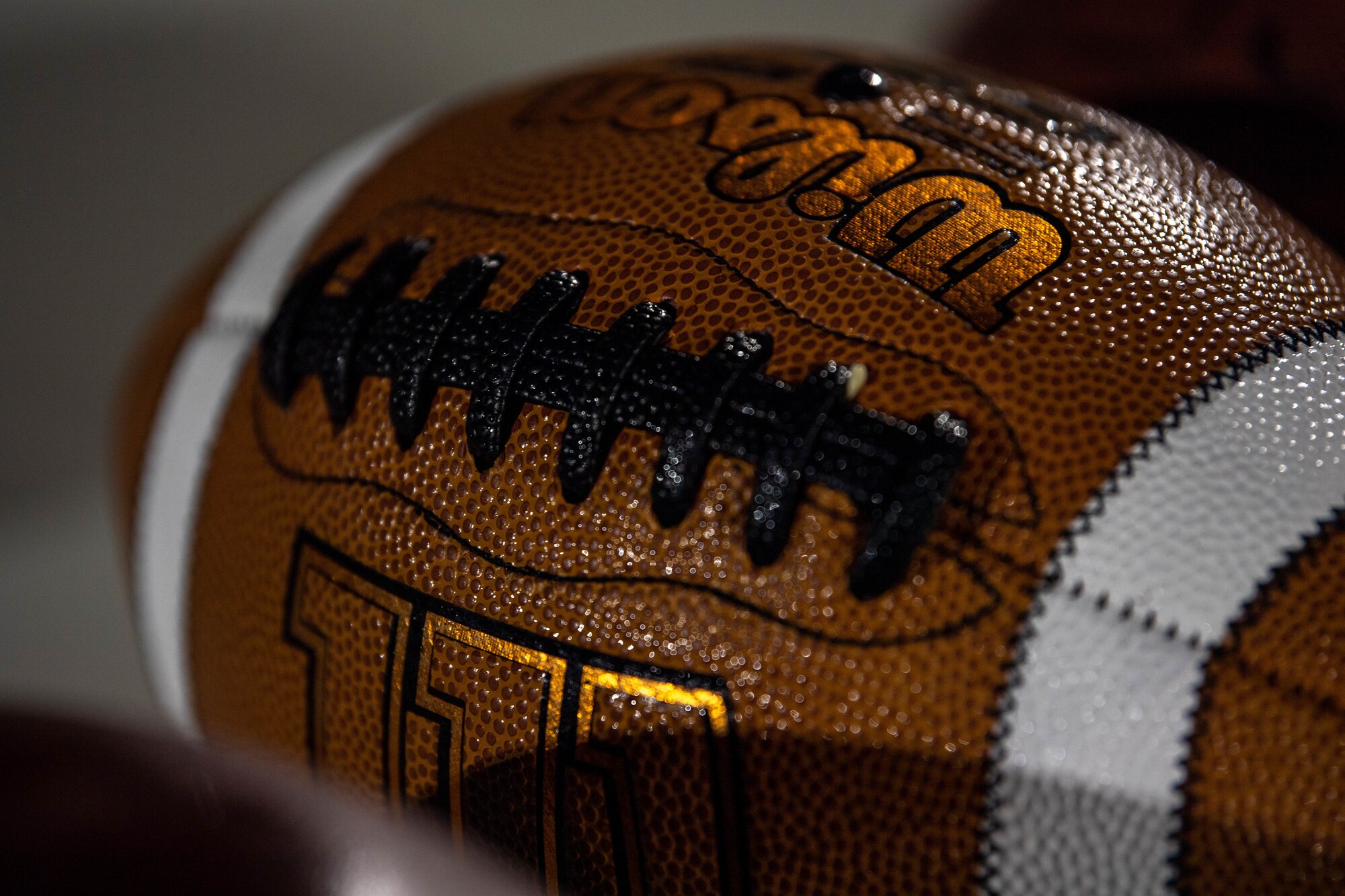 Football rests on a table