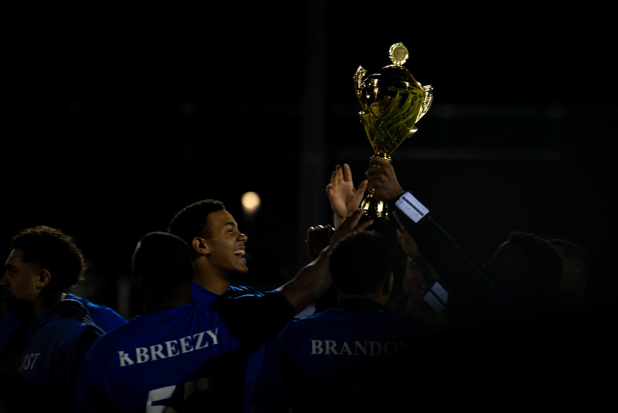 Team lifts up trophy