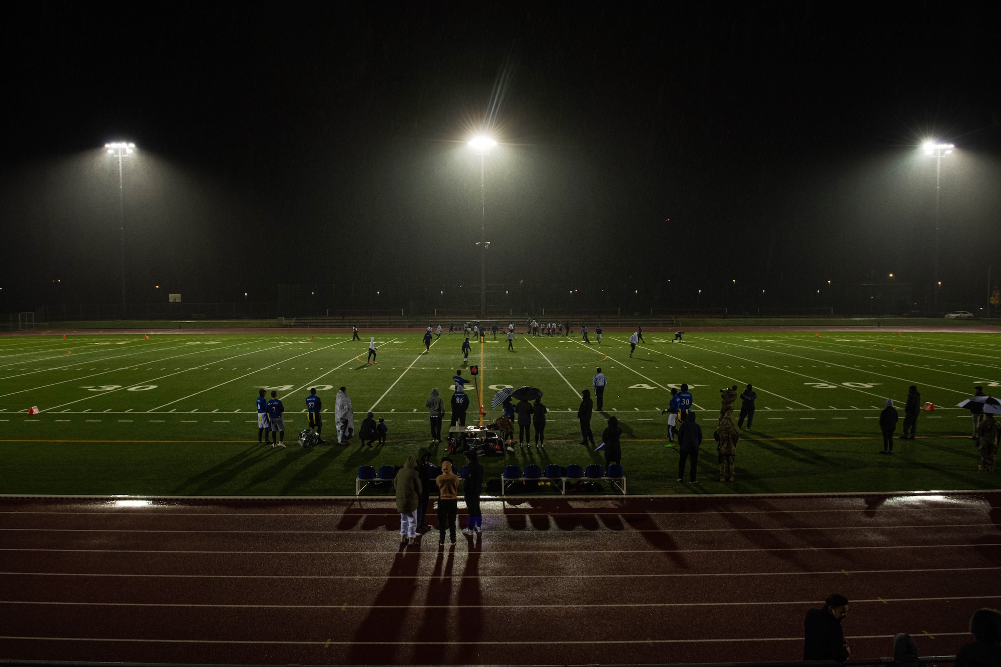 Two teams play flag football