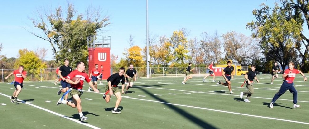 MADISON, Wis., and (October 15, 2022) – The University of Wisconsin-Madison and University of Illinois Naval Reserve Officers Training Corps (NROTC) midshipmen compete in the finals of a flag football game at the UW-Madison NROTC Fall Invitational, Oct. 15. The UW-Madison unit hosted four other NROTC units on their campus. The invitational has been an annual autumn event for 49 years. (U. S. Navy photo by Scott A. Thornbloom/Released)