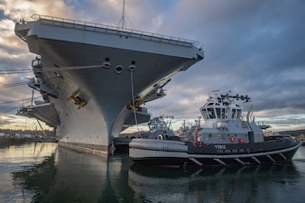 The Nimitz-class aircraft carrier USS Nimitz (CVN 68) departs Naval Base Kitsap-Bremerton for a scheduled deployment, Nov. 28, 2022.