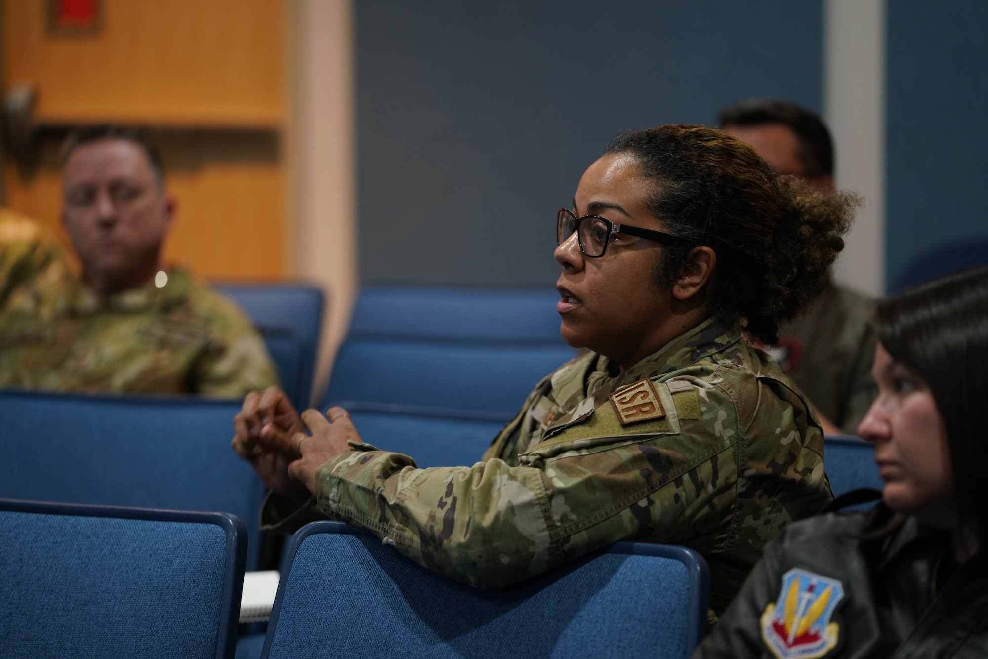 A U.S. Air Force Airman, assigned to the 432nd Wing, addresses the audience at the inaugural meeting of the wing's Women's Initiative Team (WIT) chapter at Creech Air Force Base, Nevada, Oct. 26, 2022. The WIT is composed of volunteers dedicated to identifying and eliminating barriers to women’s service in the Department of the Air Force and Department of Defense while building a community of leadership and a network of allies and support agencies. (U.S. Air Force photo by Airman 1st Class Ariel O'Shea)