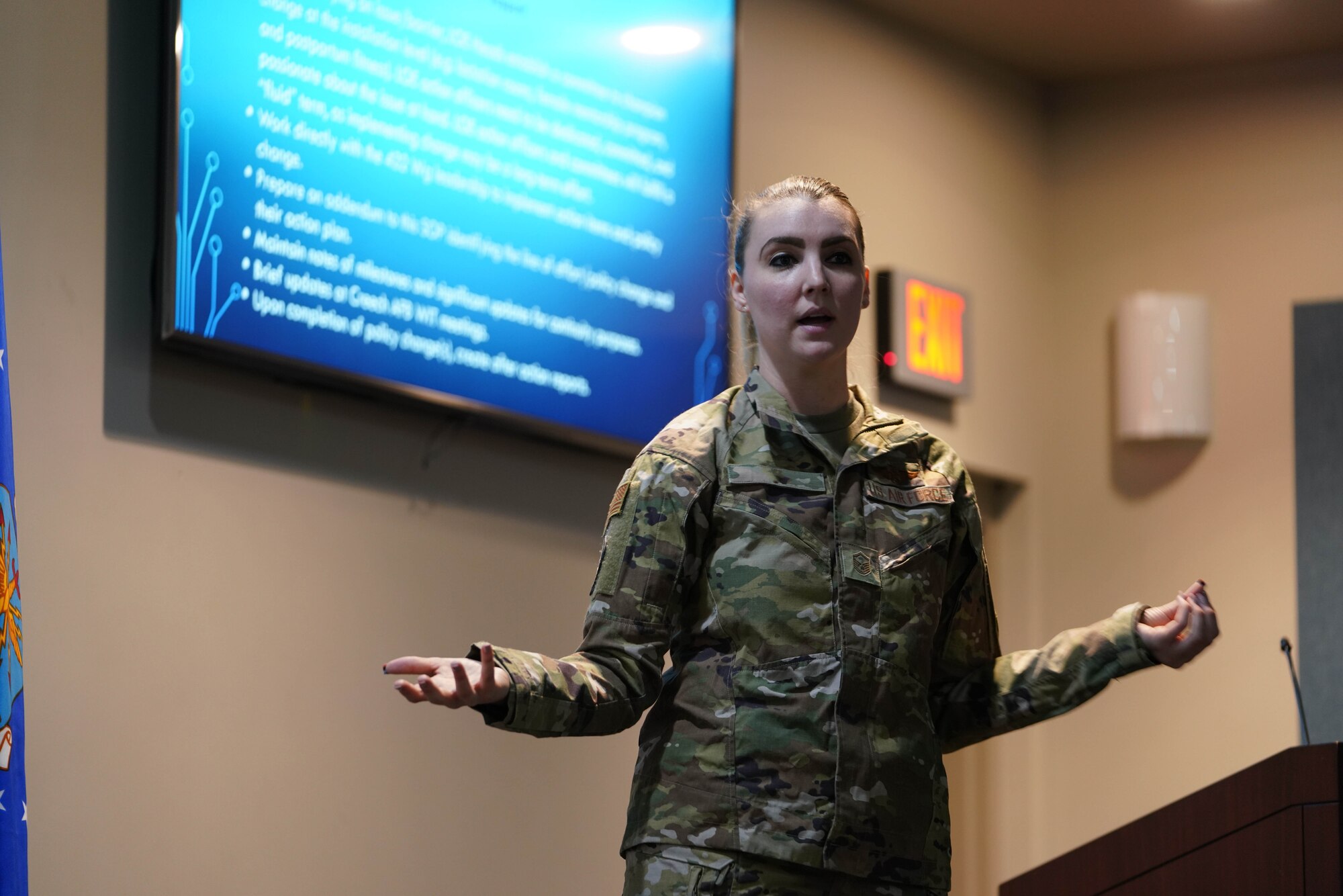 U.S. Air Force Master Sgt. Megan, team lead for the 432nd Wing chapter of the Women's Initiative Team (WIT), addresses the audience at the chapter's inaugural meeting at Creech Air Force Base, Nevada, Oct. 26, 2022. The WIT is composed of volunteers dedicated to identifying and eliminating barriers to women’s service in the Department of the Air Force and Department of Defense while building a community of leadership and a network of allies and support agencies. (U.S. Air Force photo by Airman 1st Class Ariel O'Shea)