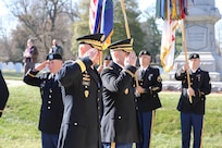 Maj. Gen. Edward Merrigan and Lt. Col. Kenneth Honken render a salute during the wreath laying ceremony of former President Zachary Taylor at the Zachary Taylor National Cemetery in Louisville, Ky.