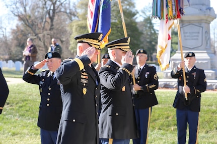 Maj. Gen. Edward Merrigan and Lt. Col. Kenneth Honken render a salute during the wreath laying ceremony of former President Zachary Taylor at the Zachary Taylor National Cemetery in Louisville, Ky.
