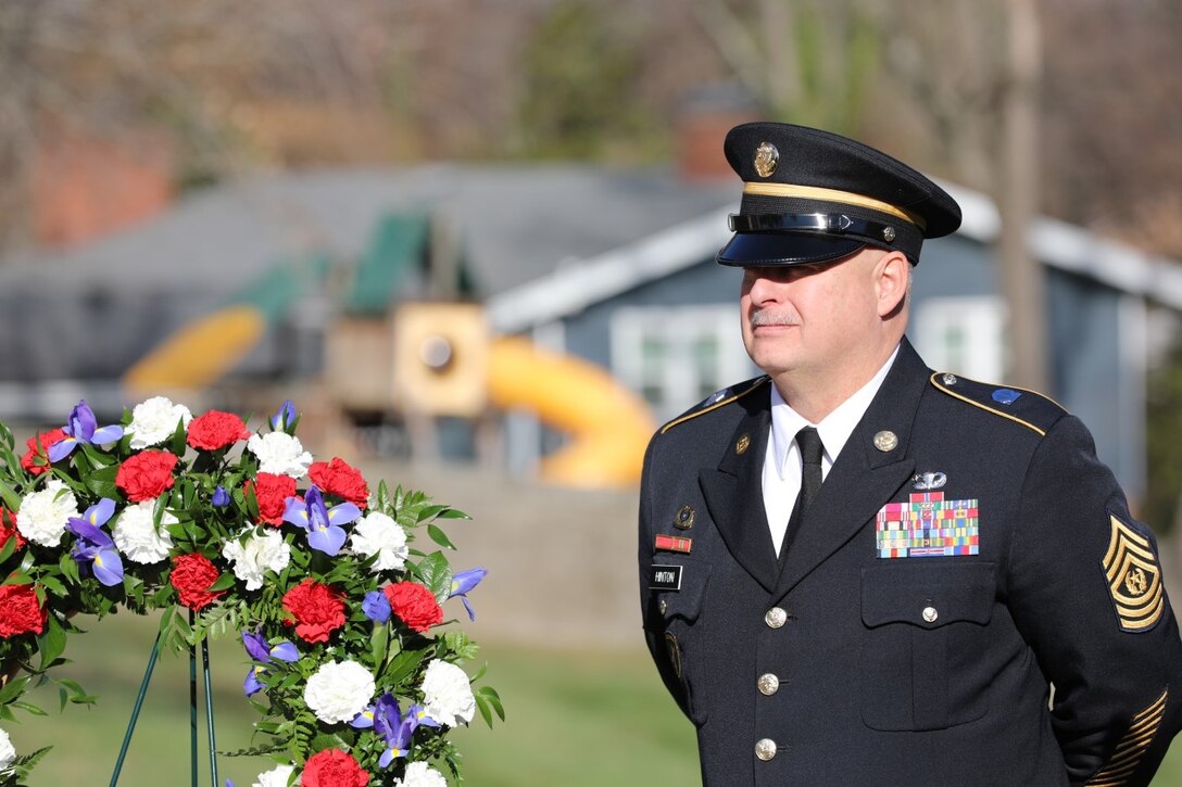 Command Sgt. Maj. Scott Hinton carefully guards the presidential wreath for Zachary Taylor at the Zachary Taylor National Cemetery on November 23, 2022.