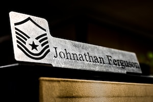 A nameplate for U.S. Air Force Master Sgt. Johnathan Ferguson, 305th Air Mobility Wing quality assurance inspector, is displayed at Joint Base McGuire-Dix-Lakehurst, N.J. on Nov. 22, 2022. Ferguson is one of over one million registered bone marrow donors through the Department of Defense’s Salute to Life program. This year he met with the recipient of a donation he made in 2012 that allowed the patient to achieve remission of leukemia.