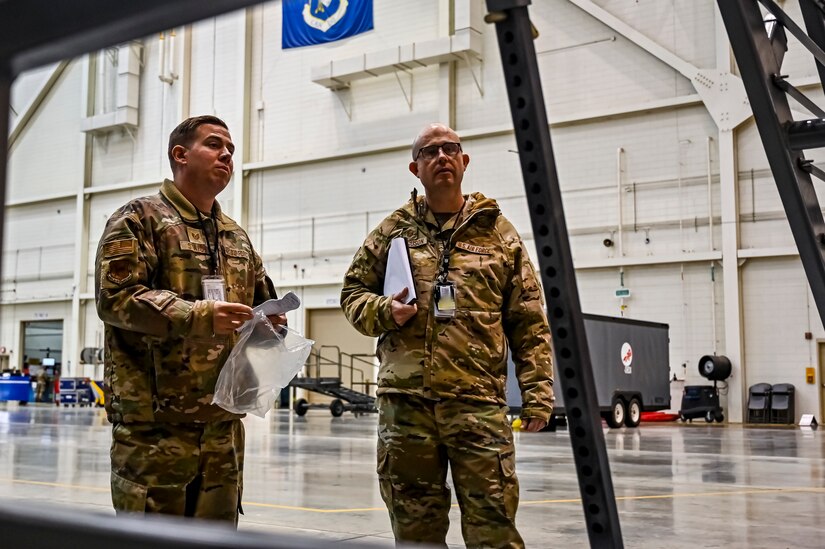 U.S. Air Force Master Sgt. Johnathan Ferguson, 305th Air Mobility Wing quality assurance inspector (Right), and U.S. Air Force Tech. Sgt. Chase Staron, 305th Air Mobility Wing crew chief, perform a quality assurance inspection at Joint Base McGuire-Dix-Lakehurst, N.J. on Nov. 22, 2022. Ferguson is one of over one million registered bone marrow donors through the Department of Defense’s Salute to Life program. This year he met with the recipient of a donation he made in 2012 that allowed the patient to achieve remission of leukemia.