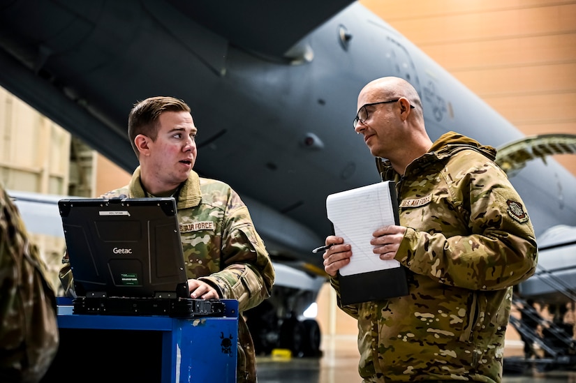 U.S. Air Force Master Sgt. Johnathan Ferguson, 305th Air Mobility Wing quality assurance inspector (Right), and U.S. Air Force Tech. Sgt. Chase Staron, 305th Air Mobility Wing crew chief (Left), perform a quality assurance inspection at Joint Base McGuire-Dix-Lakehurst, N.J. on Nov. 22, 2022. Ferguson is one of over one million registered bone marrow donors through the Department of Defense’s Salute to Life program. This year he met with the recipient of a donation he made in 2012 that allowed the patient to achieve remission of leukemia.