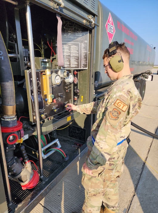 Airman refueling a plane.