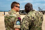 Photo of Aviation Structural Mechanic 1st Class Daneil Grace and Royal Marines Commando Warrant Officer 1st Class Mick Stanion, Command Senior Enlisted Leader of NATO's Allied Maritime Command (MARCOM).