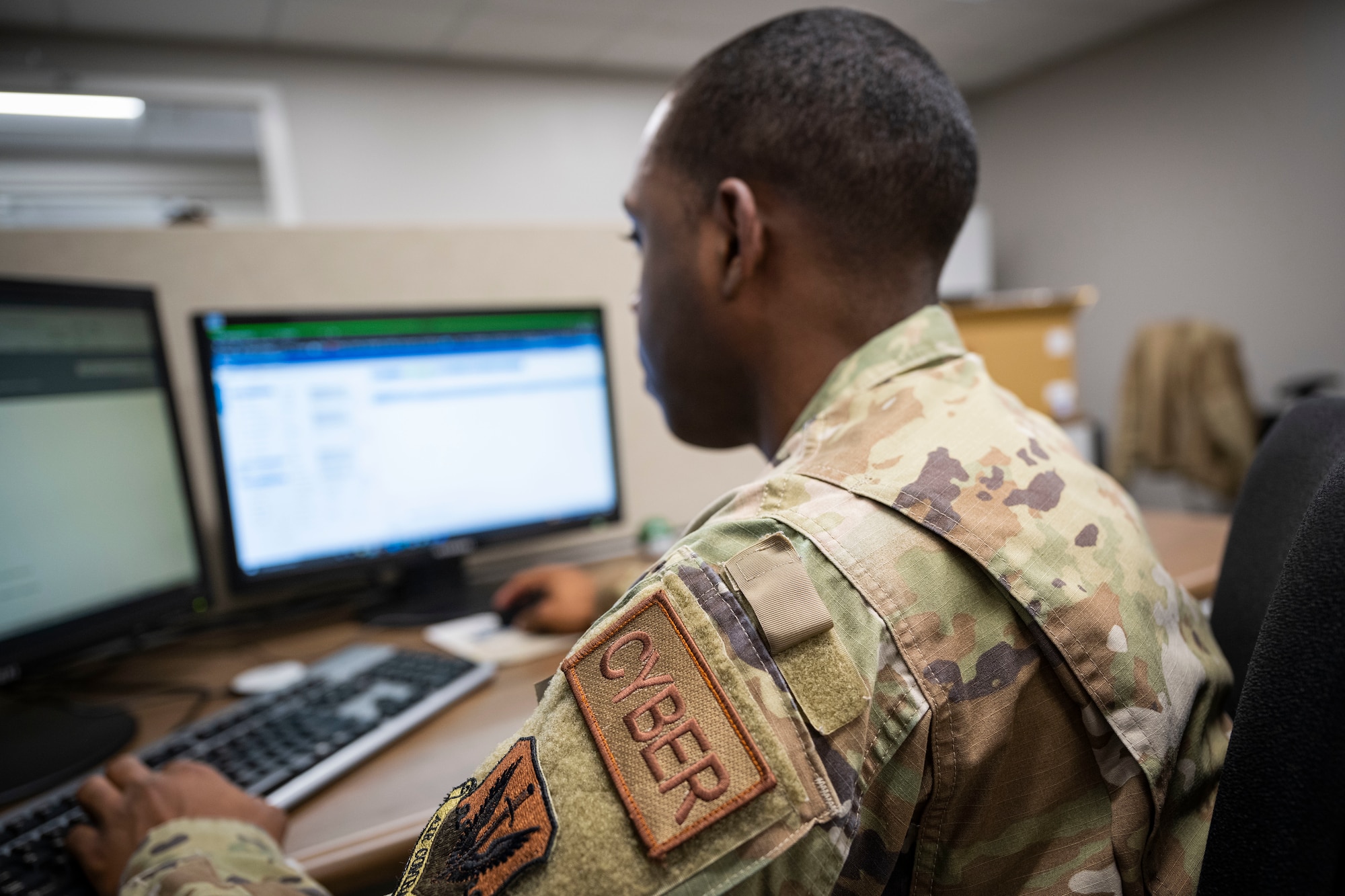 Senior Airman Davaris Williams, 4th Communications Squadron client systems technician, uses a computer at Seymour Johnson Air Force Base, North Carolina, Nov. 29, 2022. The 4th CS is responsible for command, control, communications and computers systems, operating and maintaining a $17 million network infrastructure and client support, and enabling core services for two wings and seven tenant units