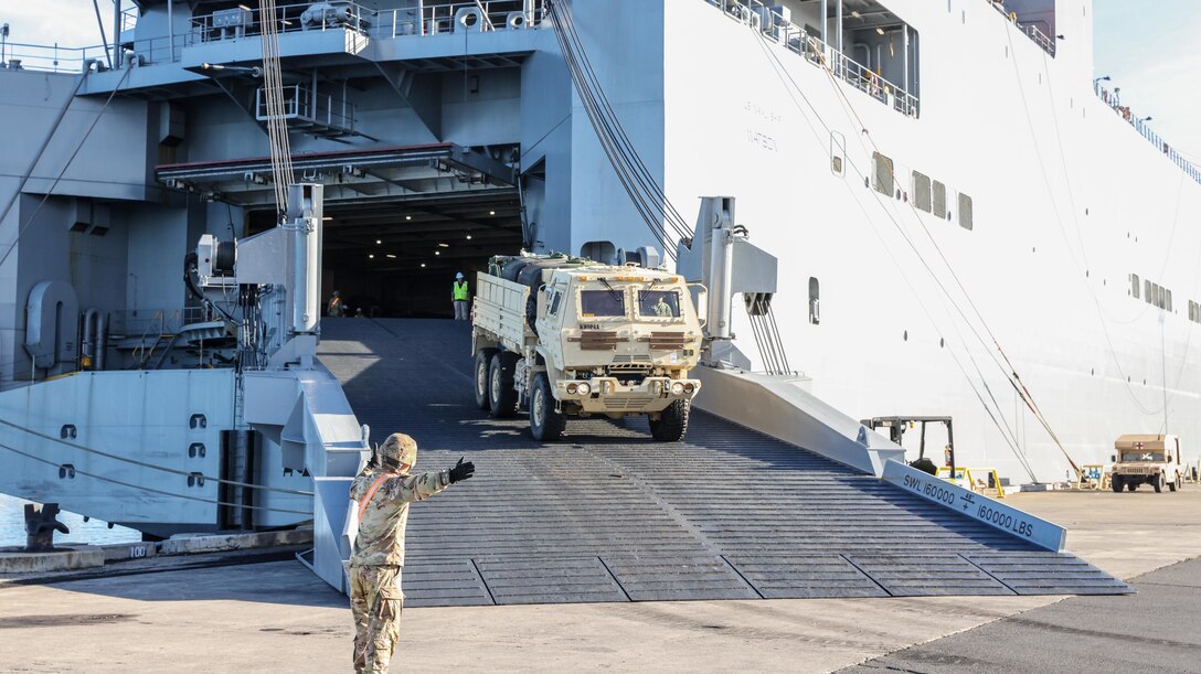 Soldiers assigned to 8th Theater Sustainment Command, 25th Infantry Division, 599th Transportation Brigade, 402nd Army Field Support Brigade, Department of Defense Contractors, and elements from the U.S. Navy downloaded military vehicles and containers as part of the Army Prepositioned Stock 3 Fix-Forward (Afloat) from the U.S. Naval Ship Watson at Honolulu, Hawaii, Nov. 29, 2022. The APS-3 mission demonstrates the 8th Theater Sustainment Command’s command and control of the APS-3 operations and assesses the operational flexibility to ensure strategic readiness. As the U.S. Indo-Pacific materiel integrator, the 8th TSC synchronizes capabilities and resources across the theater, enabling both our land forces and those of our allies and partners. Our mission is to plan, integrate, and synchronize theater distribution and sustainment operations with our joint logistics enterprise partners, stabilizing and securing the Indo-Asia Pacific Region. (Photos by Sgt. Kyler L. Chatman, 8th TSC Public Affairs)