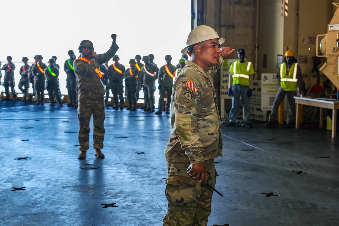Soldiers assigned to 8th Theater Sustainment Command, 25th Infantry Division, 599th Transportation Brigade, 402nd Army Field Support Brigade, Department of Defense Contractors, and elements from the U.S. Navy downloaded military vehicles and containers as part of the Army Prepositioned Stock 3 Fix-Forward (Afloat) from the U.S. Naval Ship Watson at Honolulu, Hawaii, Nov. 29, 2022. The APS-3 mission demonstrates the 8th Theater Sustainment Command’s command and control of the APS-3 operations and assesses the operational flexibility to ensure strategic readiness. As the U.S. Indo-Pacific materiel integrator, the 8th TSC synchronizes capabilities and resources across the theater, enabling both our land forces and those of our allies and partners. Our mission is to plan, integrate, and synchronize theater distribution and sustainment operations with our joint logistics enterprise partners, stabilizing and securing the Indo-Asia Pacific Region. (Photos by Sgt. Kyler L. Chatman, 8th TSC Public Affairs)