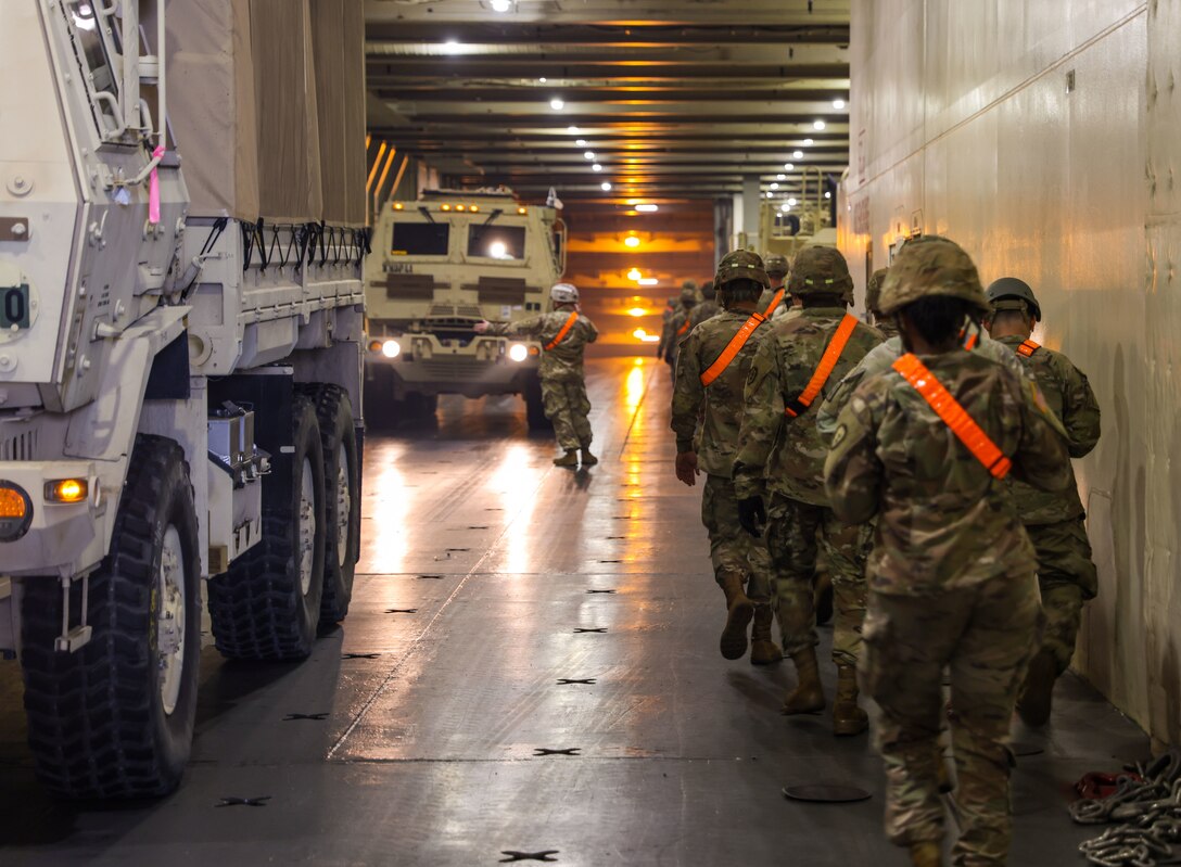 Soldiers assigned to 8th Theater Sustainment Command, 25th Infantry Division, 599th Transportation Brigade, 402nd Army Field Support Brigade, Department of Defense Contractors, and elements from the U.S. Navy downloaded military vehicles and containers as part of the Army Prepositioned Stock 3 Fix-Forward (Afloat) from the U.S. Naval Ship Watson at Honolulu, Hawaii, Nov. 29, 2022. The APS-3 mission demonstrates the 8th Theater Sustainment Command’s command and control of the APS-3 operations and assesses the operational flexibility to ensure strategic readiness. As the U.S. Indo-Pacific materiel integrator, the 8th TSC synchronizes capabilities and resources across the theater, enabling both our land forces and those of our allies and partners. Our mission is to plan, integrate, and synchronize theater distribution and sustainment operations with our joint logistics enterprise partners, stabilizing and securing the Indo-Asia Pacific Region. (Photos by Sgt. Kyler L. Chatman, 8th TSC Public Affairs)