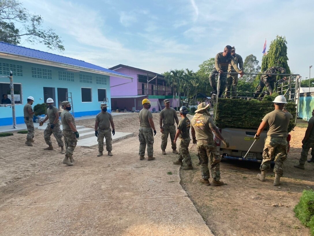 U.S. Army Reserve Soldiers from the 871st Engineer Vertical Construction Company, 411th Engineer Battalion, 9th Mission Support Command, partner with engineers from the Royal Thai Navy and the Republic of Korea Navy to build a new annex to the Ban Khao Ta-In School in the Rayong Province of the Kingdom of Thailand, Feb. 28, 2022, as part of Cobra Gold 2022. CG 22 is the 41st iteration of the international training exercise that supports readiness and emphasizes coordination on civic action, humanitarian assistance, and disaster relief. From Feb. 22 through March 4, 2022, this annual event taking place at various locations throughout the Kingdom of Thailand increases the capability, capacity, and interoperability of partnered nations while simultaneously reinforcing our commitment to a free and open Indo-Pacific. (U.S. Army Reserve Photo by 1st Lt. Apisit Meejaiyen)