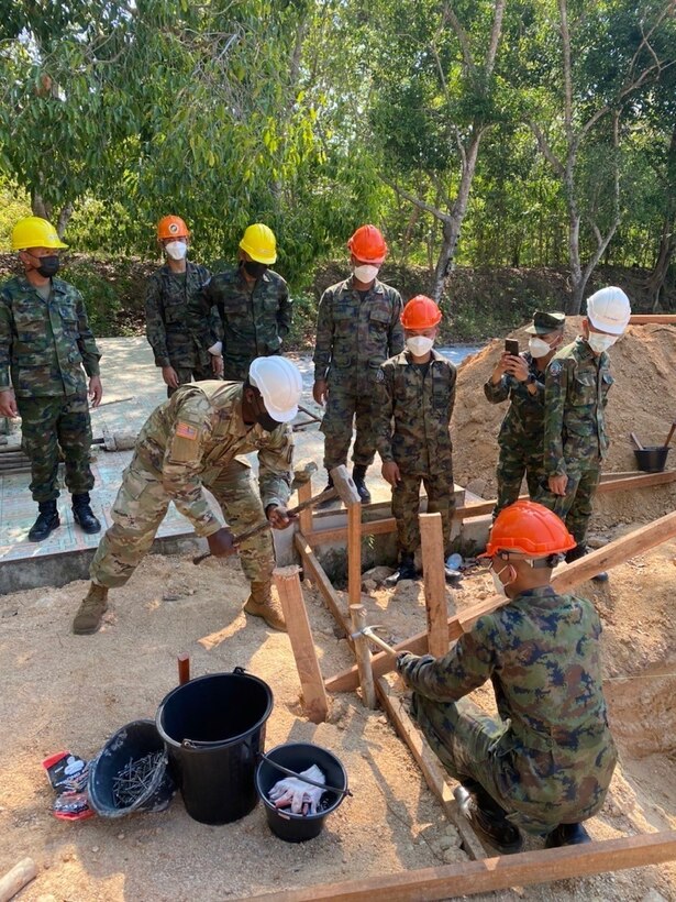 A U.S. Army Reserve Soldier from the 871st Engineer Vertical Construction Company, 411th Engineer Battalion, 9th Mission Support Command, partners with engineers from the Royal Thai Navy and the Republic of Korea Navy to build a new annex to the Ban Khao Ta-In School in the Rayong Province of the Kingdom of Thailand as part of exercise CobraGold 2022. CobraGold2022 emphasizes coordination on civic action, such as humanitarian assistance and disaster relief as we expand regional cooperation and collaboration. 9th Mission Support Command