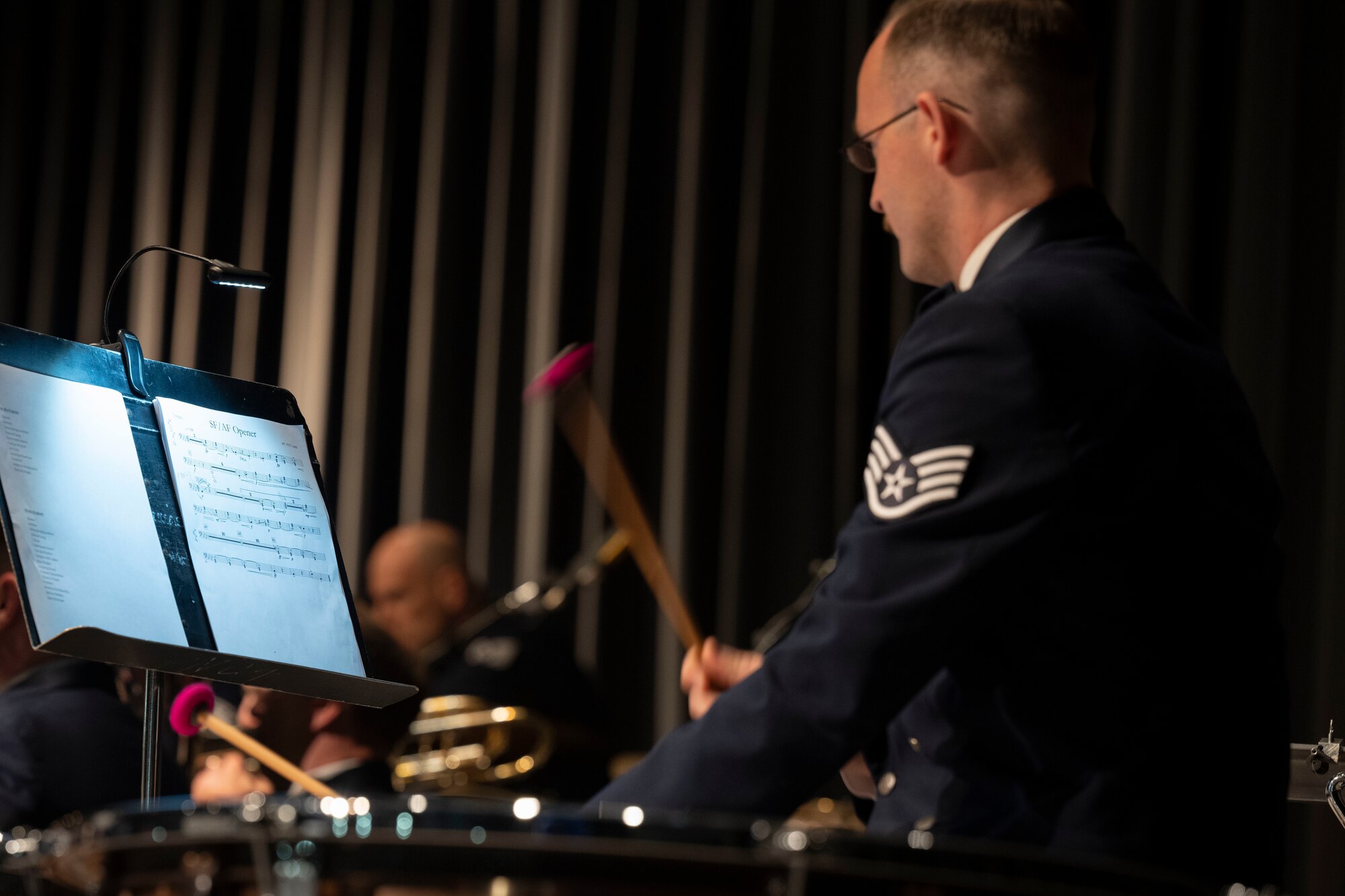 Staff Sgt. Levi Cull, United States Air Force Heritage of America Band percussionist, plays the timpani during a Veteran’s Day concert at Edgecombe Community College in Tarboro, North Carolina, Nov. 9, 2022. The U.S. Air Force Heritage of America Band’s mission is to synergize public affairs capability through music to support U.S. Air Force, Air Combat Command and Department of Defense objectives. (U.S. Air Force photo by Senior Airman Kevin Holloway)