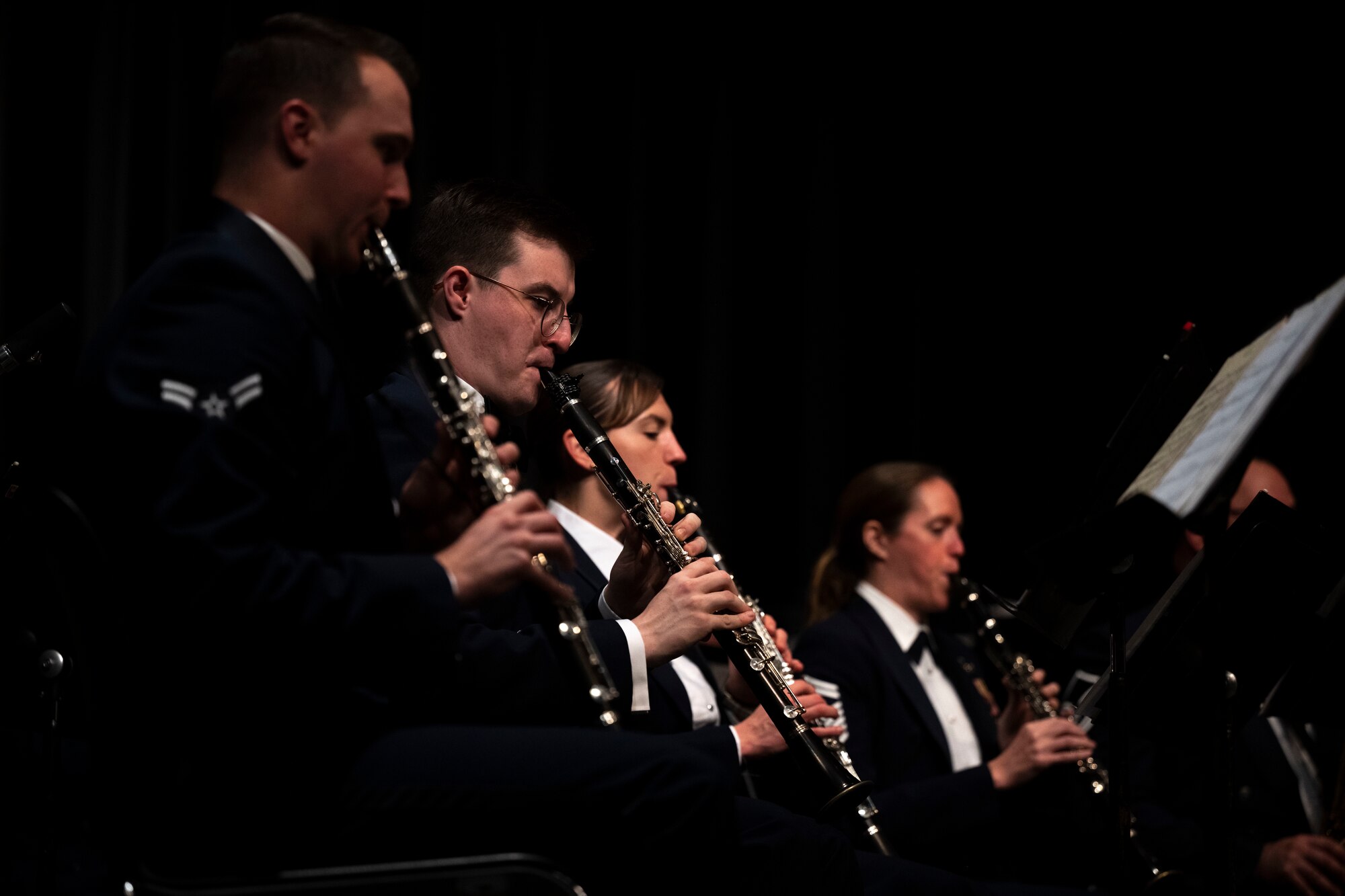 United States Air Force Heritage of America Band clarinetists play during a Veteran’s Day concert at Edgecombe Community College in Tarboro, North Carolina, Nov. 9, 2022.  The Heritage of America Band honors all who have served in the United States Armed Forces by commemorating the contributions of the nation's veterans; past and present, both at home and in deployed locations around the world. (U.S. Air Force photo by Senior Airman Kevin Holloway)