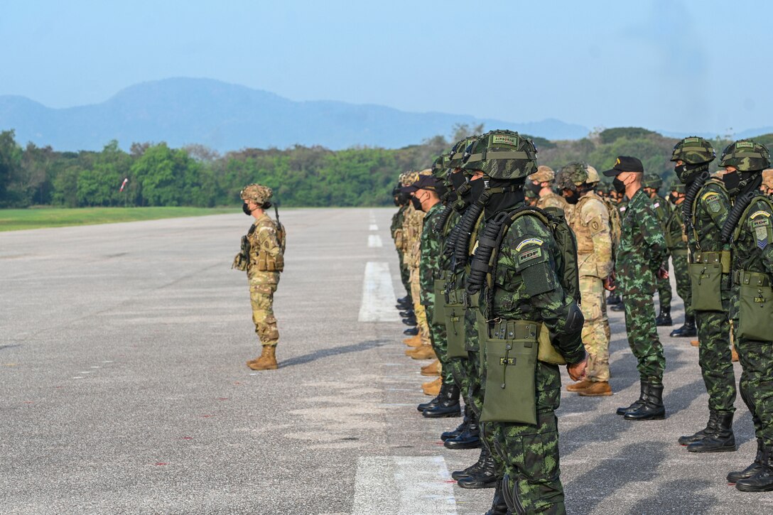 Soldiers with the U.S. Army and the Royal Thai Army stand in formation during the opening ceremony for Hanuman Guardian 2022 at the Infantry Center, Khao Noi, Kingdom of Thailand, Feb. 24, 2022. Hanuman Guardian 2022 is the 11th iteration of the annual bilateral U.S. Army Pacific Theater Security Cooperation Program event conducted with the Royal Thai Army in coordination with United States Indo-Pacific Command. As part of the Pacific Pathways series, the goal of HG22 is to foster closer relationships, increase readiness, and enhance interoperability among service members of the U.S. Army and Royal Thai Army. (U.S. Army photo by Danielle O'Donnell)