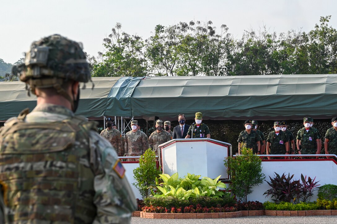 A U.S. Soldier stands in formation as Gen. Narongpan Jitkaewthae, the commander-in-chief of the Royal Thai Army, gives remarks at the opening ceremony for Hanuman Guardian 2022 at the Infantry Center, Khao Noi, Kingdom of Thailand, Feb. 24, 2022. Hanuman Guardian 2022 is the 11th iteration of the annual bilateral U.S. Army Pacific Theater Security Cooperation Program event conducted with the Royal Thai Army in coordination with United States Indo-Pacific Command. As part of the Pacific Pathways series, the goal of HG22 is to foster closer relationships, increase readiness, and enhance interoperability among service members of the U.S. Army and Royal Thai Army. (U.S. Army photo by Danielle O'Donnell)