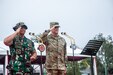 Gen. Charles Flynn, Commanding General of the U.S. Army Pacific and Gen. Andika Perkasa, Commander in Chief Indonesia National Defense Forces salutes the formation of troops during the opening ceremony of Super Garuda Shield 22, Baturaja, Indonesia, Aug. 3, 2022. Super Garuda Shield, a part of Operation Pathways and a longstanding annual, bilateral military exercise conducted between the U.S. military and Indonesia National Armed Forces, which has grown to 14 participating nations, reinforces the U.S. commitments to our allies, and  regional partners,  joint readiness, and the interoperability to fight and win together.  (U.S. Army Reserve photo by Staff Sgt. Stephanie A. Hargett)