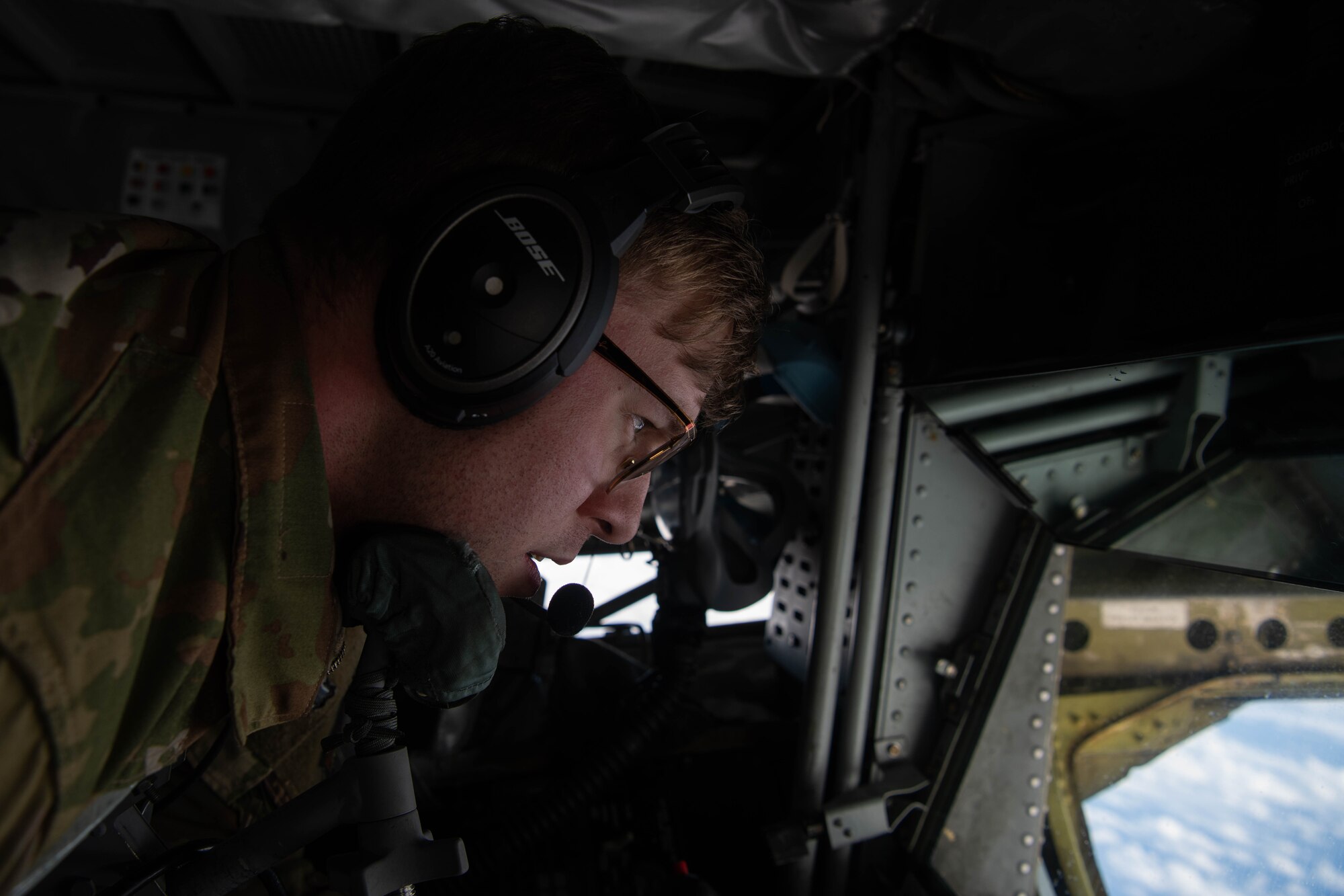 An Airman performs aerial refueling.