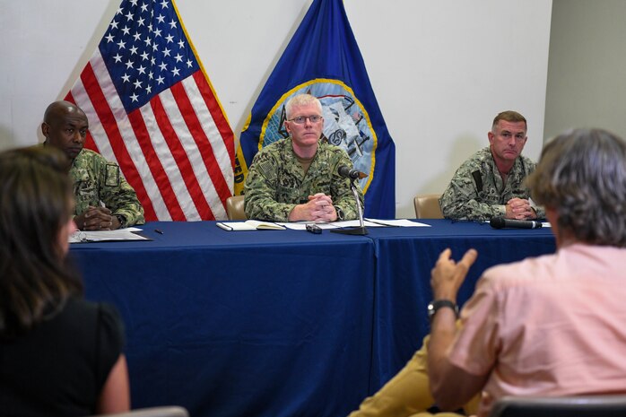 Members of the U.S. Navy leadership assigned to Navy Region Hawaii, Joint Task Force-Red Hill (JTF-RH), and Naval Facilities Engineering Systems Command (NAVFAC) Hawaii listen to questions from the local media at the Navy Region Federal Fire Department, Honolulu, Hawaii, Nov. 30, 2022