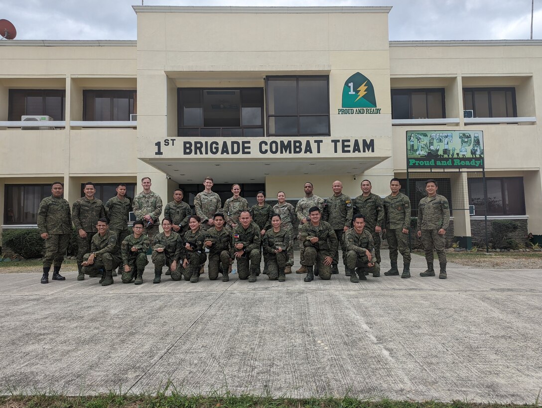 Medical Advisors from 5th Security Force Assistance Brigade pose for a photo alongside Soldiers from the Philippine Army at Fort Magsaysay, Philippines, Mar. 11th, 2022. Twenty Filipino Soldiers from a variety of medical specialties took part in the event focused on medical logistics, medical concepts, force health protection, and tactical fitness.