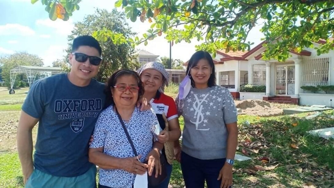 Staff Sgt. Michael Bamba, Maneuver Advisor Team 5333, Force Package 22-1-I, 5th Security Force Assistance Brigade, poses with his mother and sisters during a visit to Angeles City earlier this year during MAT 5333’s operational rotation to the Philippines.