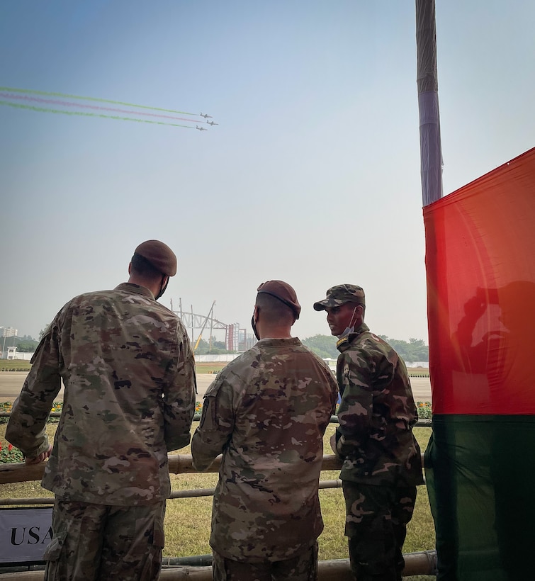 Staff Sgt. John Garrity and Staff Sgt. Tony Laureano observe the rehearsal for the Victory Day Parade honoring the 50th anniversary of Bangladesh independence in Dhaka, Bangladesh on Dec. 12, 2021.

Advisors from Team 5311 traveled to Dhaka, Bangladesh to participate in the Victory Day cultural program to build relationships with Bangladeshi Army counterparts. Team 5311’s partnership will continue with the Bangladesh Army in preparation for exercise Tiger Lightning 2022 later this year.