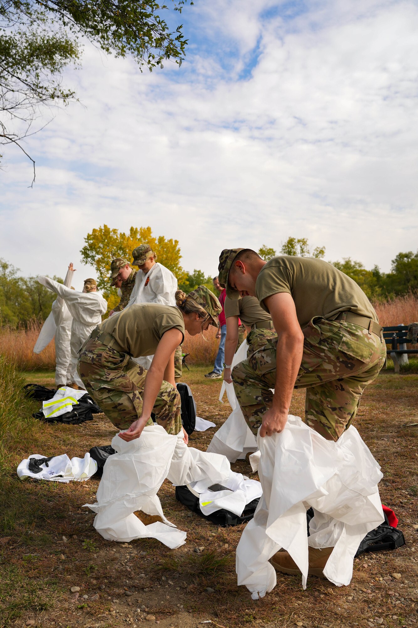 Airmen with the 114th Fighter Wing Force Support Squadron practice search and recovery procedures in various terrain during a field exercise during October’s Unit Training Assembly at Great Bear Recreation Park, Sioux Falls, South Dakota, Oct. 1, 2022. During the training, individuals used meticulous search methods to locate items that may be found in a real-world situation like personal effects and human remains. (U.S. Air National Guard photo by Staff Sgt. Jorrie Hart)