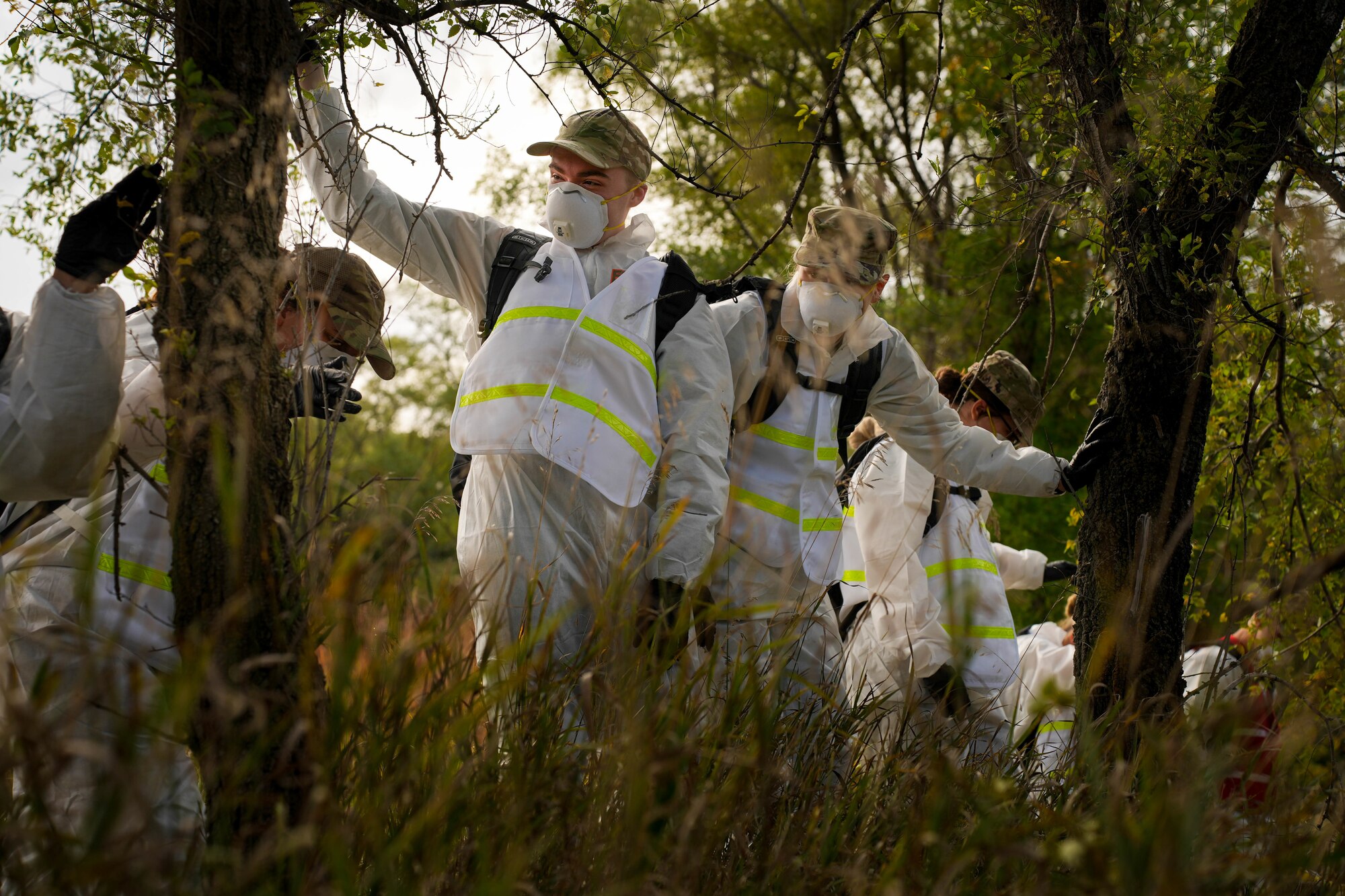 Airmen with the 114th Fighter Wing Force Support Squadron practice search and recovery procedures in various terrain during a field exercise during October’s Unit Training Assembly at Great Bear Recreation Park, Sioux Falls, South Dakota, Oct. 1, 2022. During the training, individuals used meticulous search methods to locate items that may be found in a real-world situation like personal effects and human remains. (U.S. Air National Guard photo by Staff Sgt. Jorrie Hart)