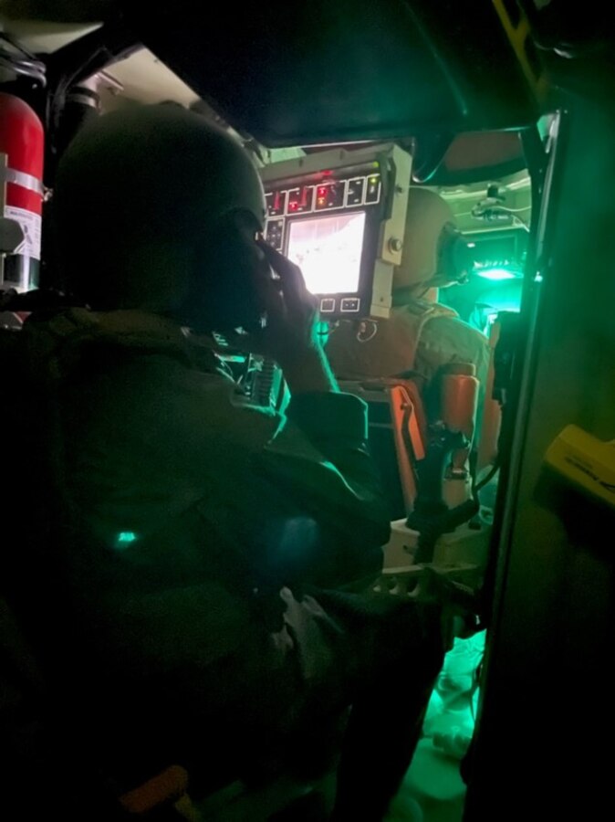 Students attached to the AAUL 2-22 scan their sectors of fire with the Crew Remote Operating Weapons System (CROWS) to establish Defensive counter measures.