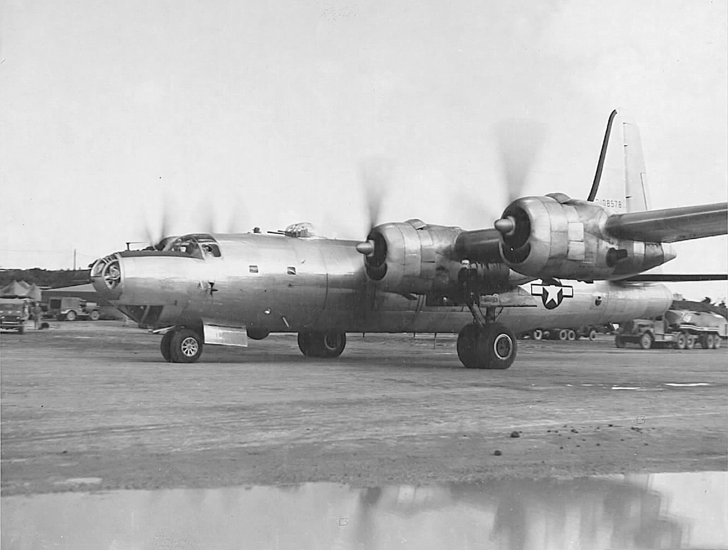 Just before a flight to Luzon in the Philippines on August 25, 1945, this B-32 taxis at Yontan Air Strip (sic) on Okinawa, showing its huge single vertical tail. Originally designed with twin vertical tails, and something of a contestant against Boeing’s advanced B-29, only 115 Convair B-32 Dominators were built, with only 15 of the big bombers seeing very limited action in the final months of the Western Pacific. On August 17, 1945, 2 days after word came of the Japanese surrender, 2 B-32s of the USAAF’s 386thBS, 312th BG were sent out on a photo-recce mission to monitor the state of operations of selected Japanese air bases. Japanese Navy fighters intercepted them and attacked the Dominators. Among the attackers was newly promoted (August 1, 1945) high-scoring Navy ace Ltjg. Saburo Sakai flying an N1K1 Shiden (code-named “George”). He had lost his right eye on August 7, 1942, flying a Zero and attacking SBD Dauntlesses over Guadalcanal. His tortured flight back to his base on Rabaul became one of the epochal survival stories of the Pacific air war. Although Sakai’s accepted total is 64 kills in China and the Pacific, many historians now believe his total was much less, perhaps no less than 28. Actually, Sakai, himself never made the claim his total was 64. (National  Archives and Records Administration)