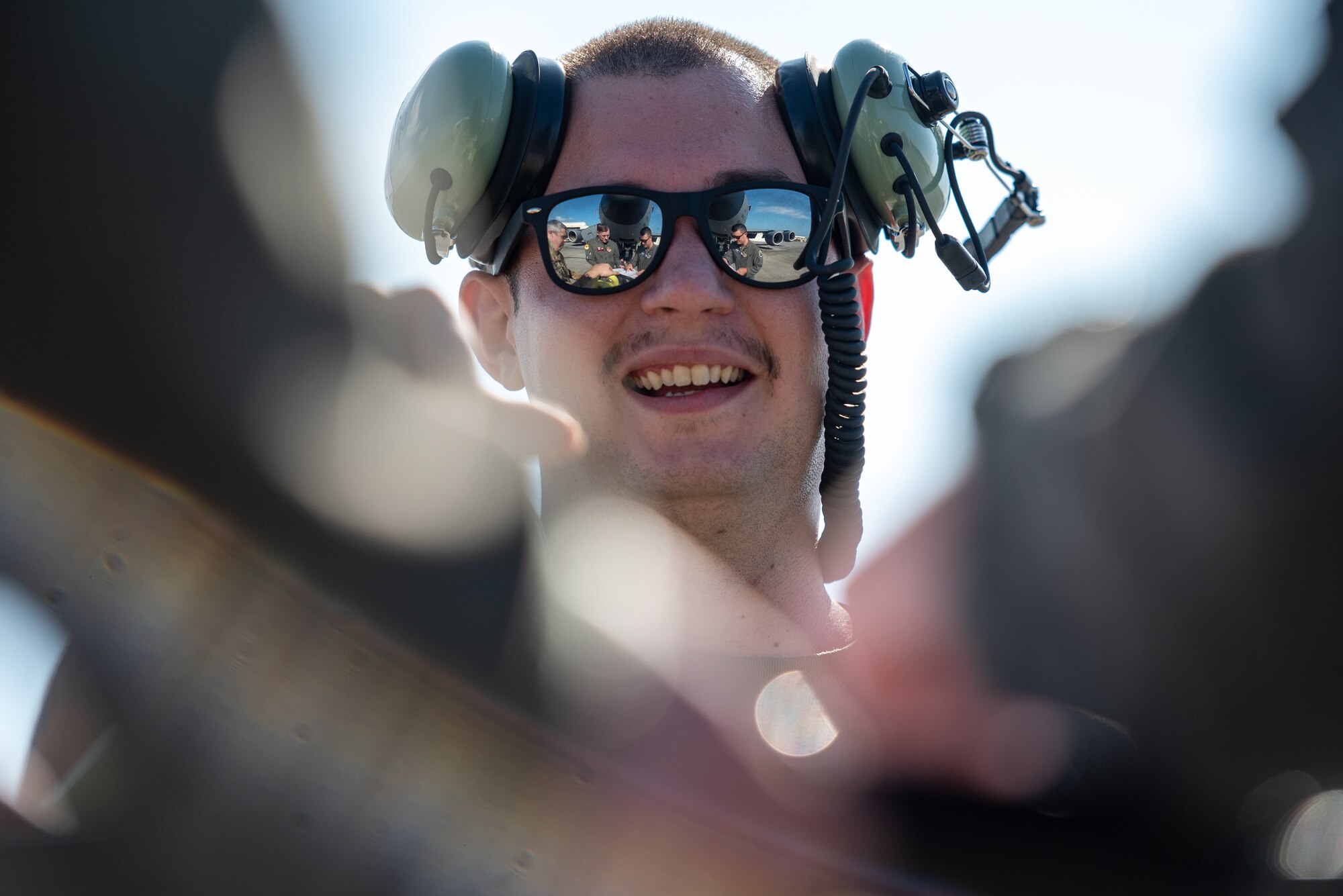 airman listens to a maintenance preflight check