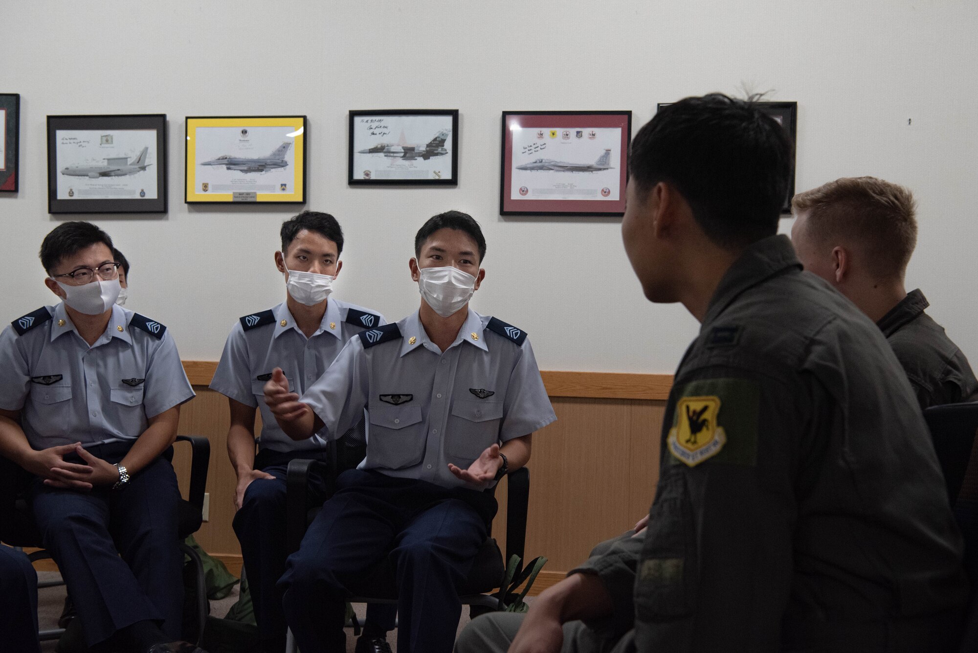 JASDF cadets speak with pilots.