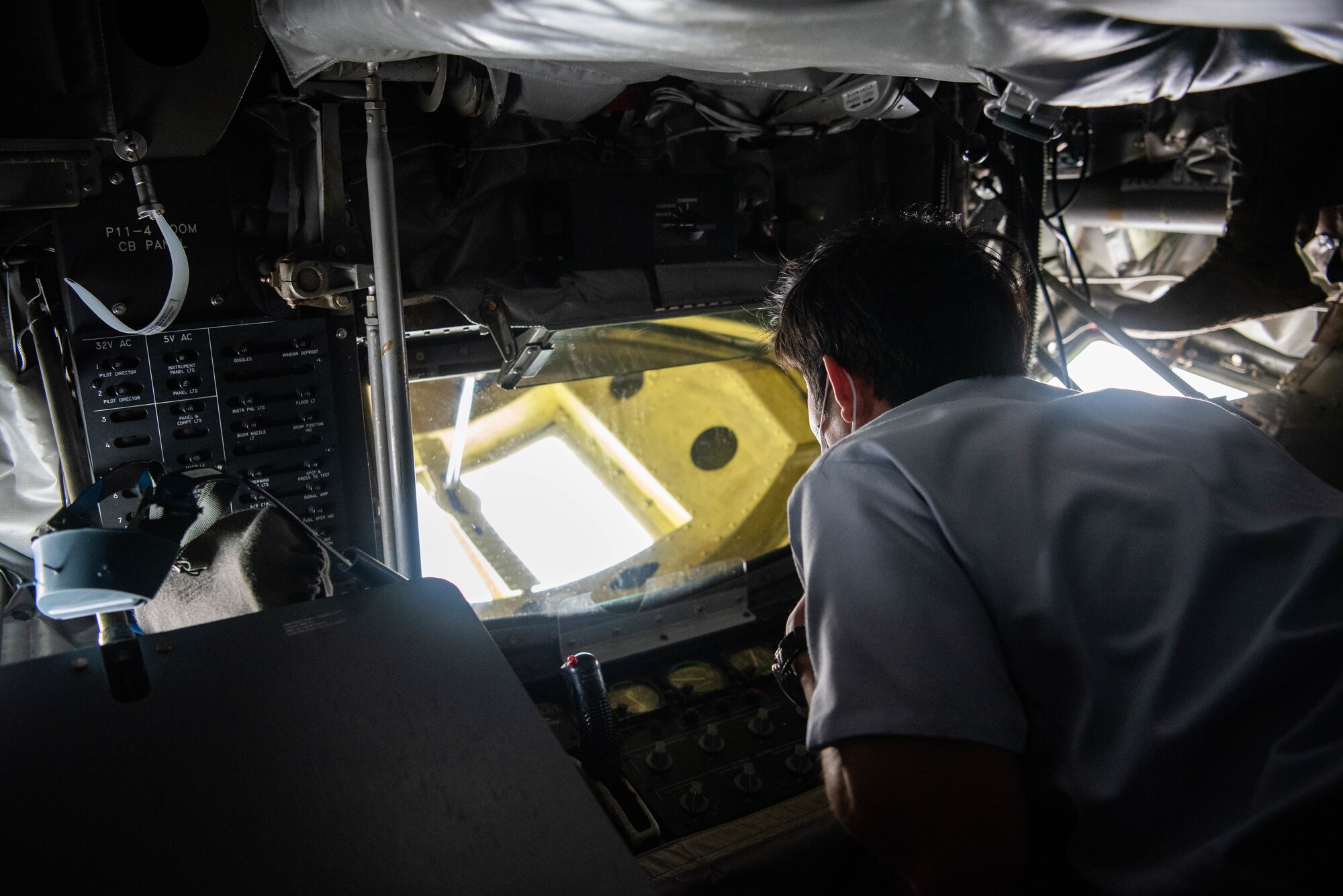 A JASDF cadet views a static display.