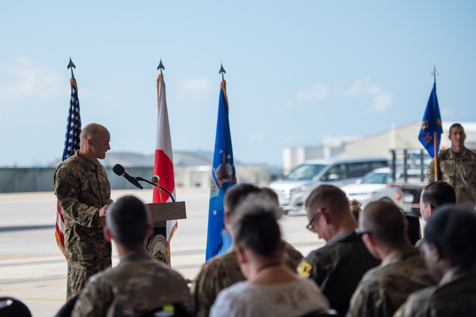18th Operations Group commander, addresses the 5th Expeditionary Airborne Command and Control Squadron during a deactivation ceremony