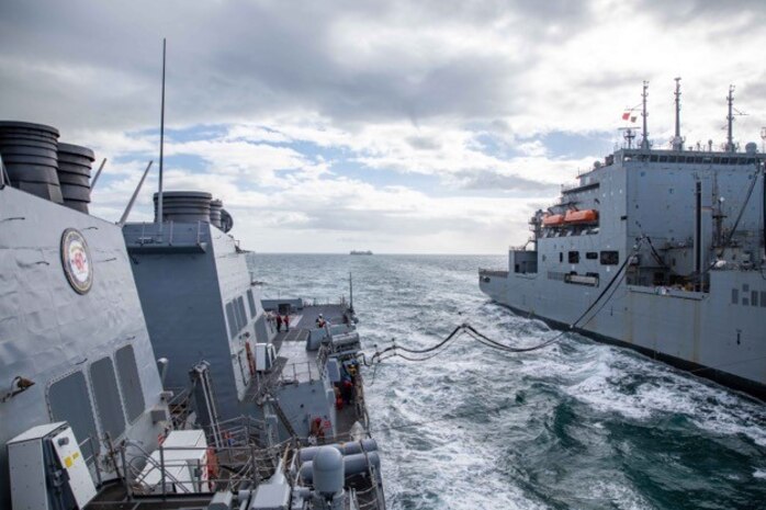 The Arleigh Burke-class guided-missile destroyer USS Roosevelt (DDG 80) conducts a replenishment-at-sea with dry cargo ship USNS William McLean (T-AKE 12), Oct. 1, 2022.