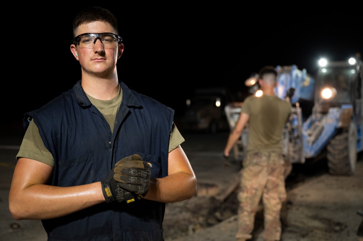 U.S. Air Force Airman 1st Class Bryce Tharman, 386th Expeditionary Civil Engineer Squadron pavements and equipment operator, says the mission fixing two upheavals on the flightline at an undisclosed location on August 5, 2022, has been the highlight of his deployment so far. “It's been a blast getting to come out here with the great leadership and the great people and working together to get the task done in a timely manner.” (U.S. Air Force photo by Staff Sgt. Dalton Williams)