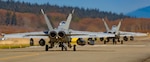 WHIDBEY ISLAND, WA (March 29, 2019) Two EA-18G Growlers from squadron VAQ-136 taxi toward the runway at Ault Field as they prepare to take off.