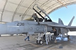 The first F/A-18 Super Hornet fighter aircraft to undergo the Service Life Modification (SLM) procedure at a naval aviation depot is pictured at the FRCSW testline June 29. The aircraft, assigned to Strike Fighter Squadron (VFA) 106, will undergo induction for the SLM that will extend the airframe’s flight hours from 6,000 to 7,500. The procedure is estimated to take about 17 months.