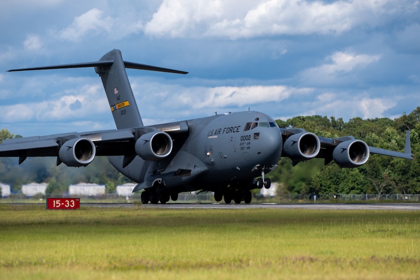 A C-17 Globemaster III Lands.