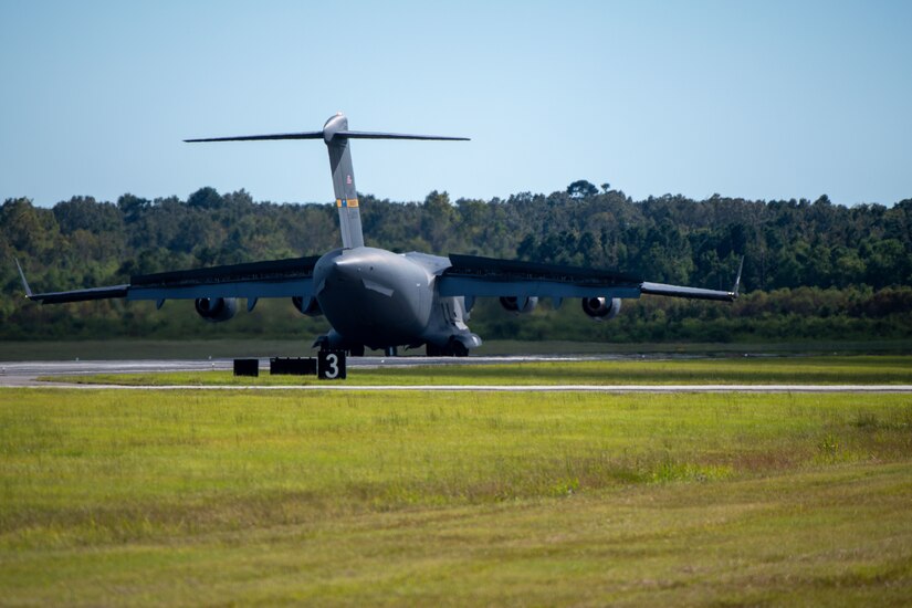 A C-17 Globemaster III Lands.