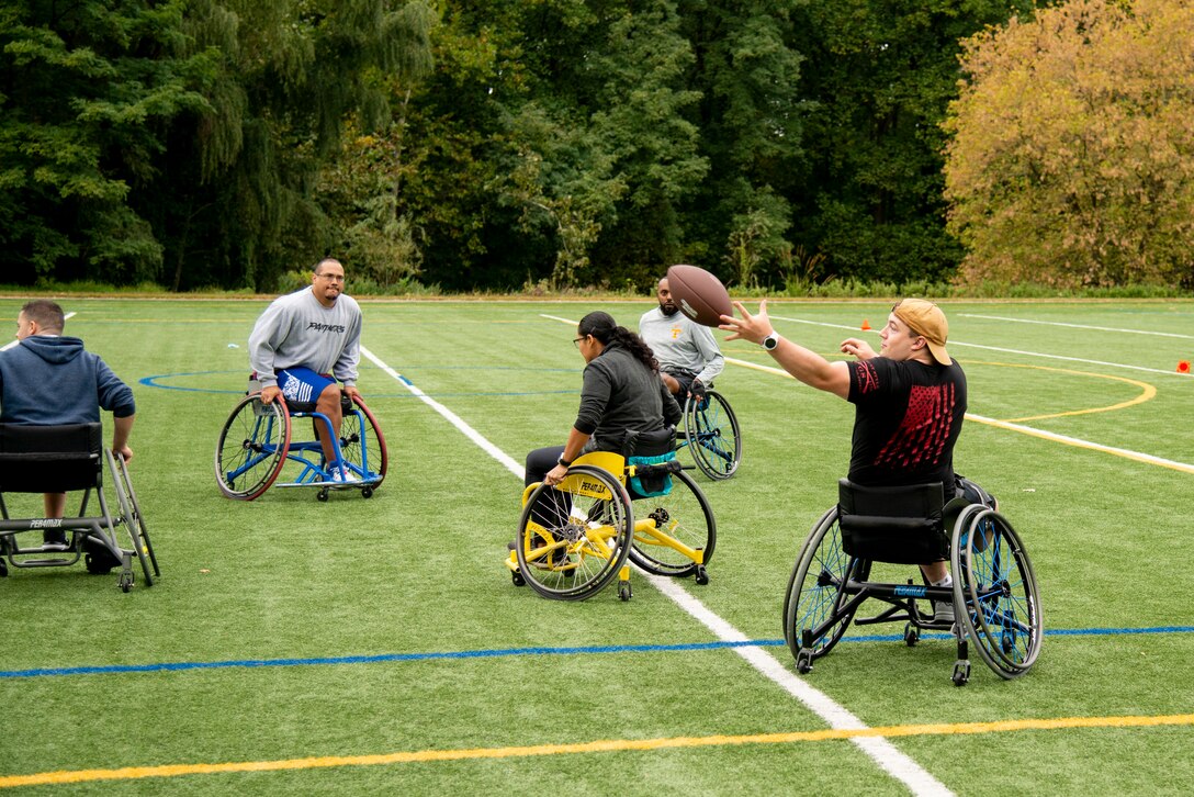 Athletes play a short game of wheelchair football.