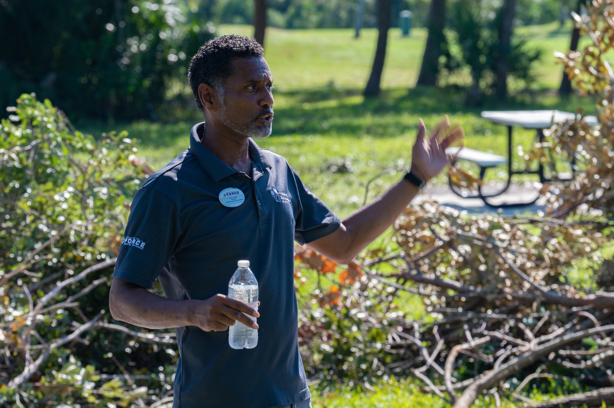 Dean Ireland, the 6th Force Support Squadron outdoor recreation director, takes a break during a base cleanup