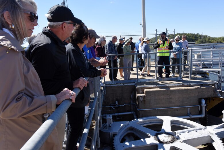 Lock Operator Josh Shockey (wearing reflective vest) leads a group of Tellico Village New Villagers on a tour Sept. 29, 2022, of Fort Loudoun Lock on the Tennessee River in Lenoir City, Tennessee. (USACE Photo by Lee Roberts)