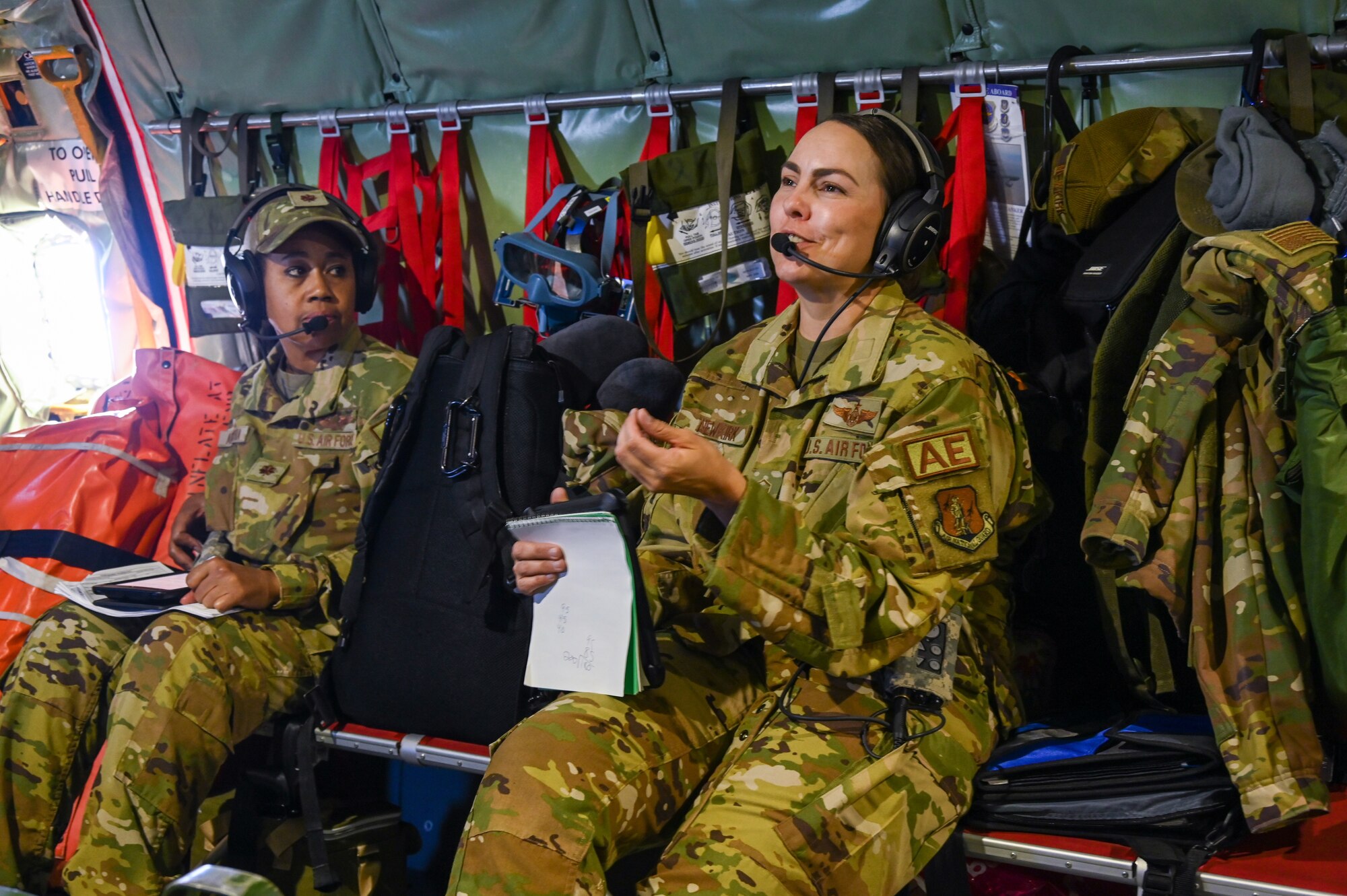 Aeromedical evacuation technicians with the 137th Aeromedical Evacuation Squadron, treats a simulated patient during a casualty transportation scenario on a 507th Air Refueling Wing KC-135 Stratotanker from the 507th Air Refueling Wing, Tinker Air Force Base, Okla., June 9, 2022. (U.S. Air Force photo by Master Sgt. Grady L. Epperly/Released)